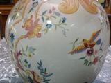 a vase that is sitting on a table in a room