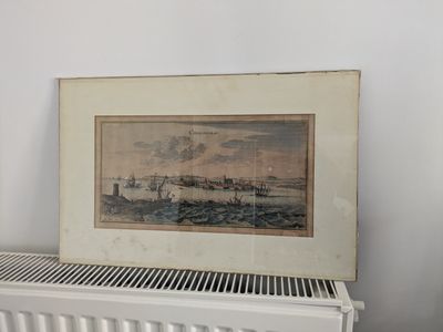 a picture of a painting on a radiator next to a radiator