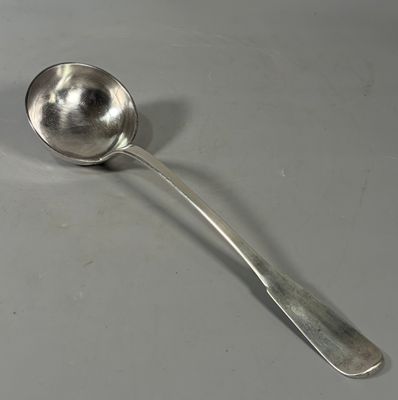a spoon that is sitting on a table