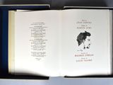 an open book with a picture of a dog inside of it
