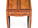 an image of a small wooden desk with a drawer on top of it