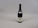 a bottle of wine that is sitting on a table