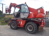 a red crane that is parked in a lot