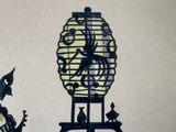 a drawing of a birdcage with a bird and a bird on it
