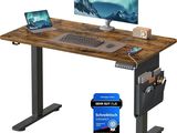 an image of a computer desk with a monitor and keyboard