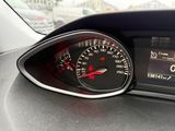 a close up of a dashboard with a speedometer on it