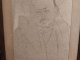 dessin représentant un homme en costume-cravate tenant un téléphone portable