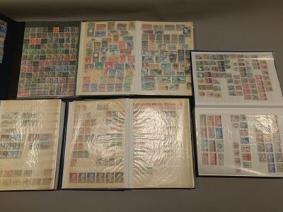 many different types of stamps on the pages of a book