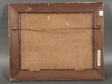 an old picture frame with a piece of paper taped to it