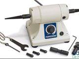 an image of a small electric polisher with tools