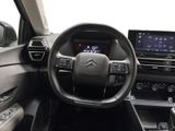 the interior of a car with a steering wheel, dashboard, and dash board
