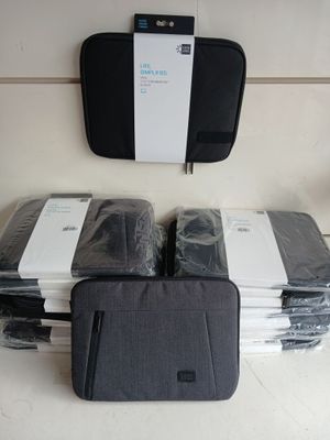 a lot of bags of luggage sitting on a table