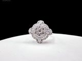 an image of a diamond ring on a white plate