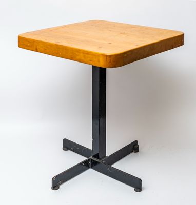 an image of a small table with a wooden top