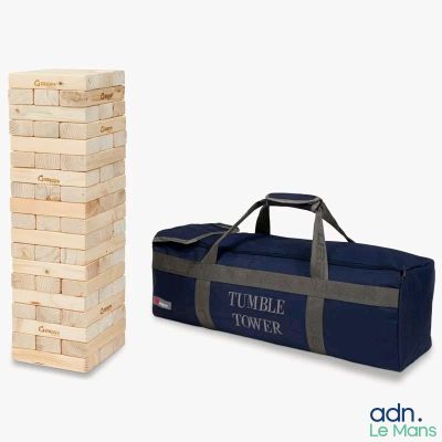 the large wooden tower is next to a duffel bag