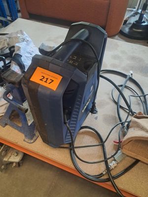 a picture of a work bench with a lot of tools on it