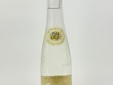 an image of a bottle of wine sitting on top of a table