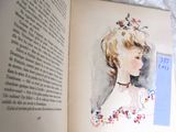 an open book with a picture of a woman on it