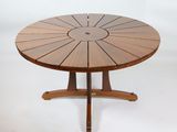 an image of a wooden table with a circular top