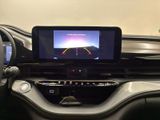a picture of a car dashboard with a monitor on it