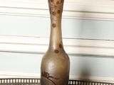 a vase that is sitting on a table in a room