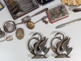 a lot of silver items on the table