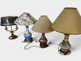 three lamps that are sitting next to each other on a table