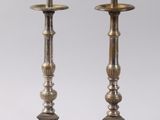 pair of antique brass candlesticks on stand