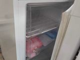 an open refrigerator with a lot of food inside of it