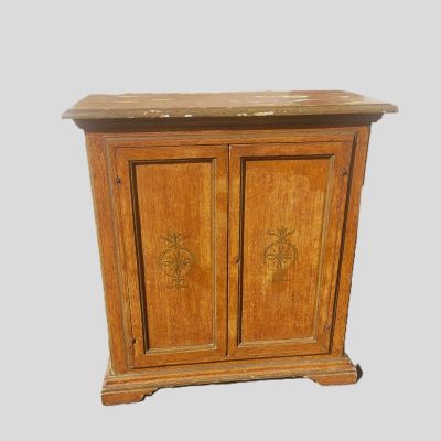 a wooden cabinet with two doors and a marble top