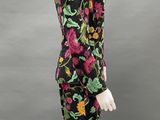 a black and pink floral print dress with long sleeves