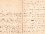a handwritten letter written in black ink on a piece of paper