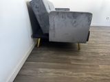 a chair that is sitting in the corner of a room