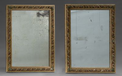 paire de miroirs anciens à cadre doré, ornés de motifs floraux