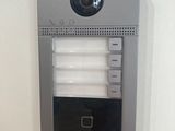 an image of a video camera mounted to a wall