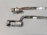 two wrenes that are sitting on a table