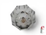 a clear glass knob with a hole in the middle of it