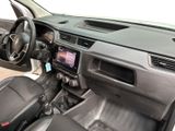 the interior of a car with a steering wheel and dashboard controls