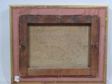 an old picture frame with a pink background and a brown border