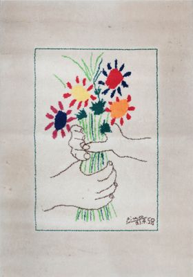 embroidered picture of a hand holding a bouquet of flowers in a vase