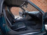 a picture of the inside of a car with the door open