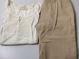 two pieces of clothing are sitting on a table next to each other