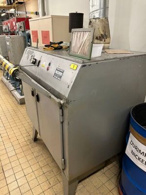 une image d'une machine qui se trouve dans une cuisine