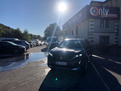a car that is parked in front of a building