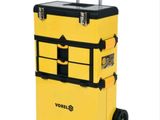 the yellow and black suitcase is sitting on a white surface