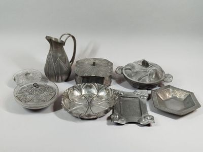a lot of silver items that are on the table