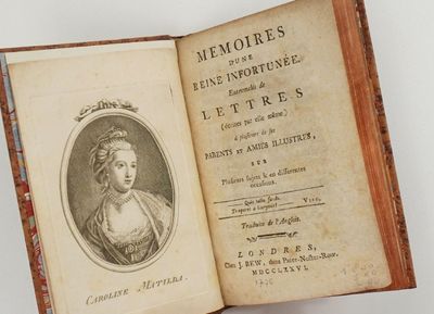 an old book with a picture of a woman on it