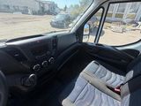 the interior of a van with the driver ' s seat up