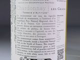 a bottle of wine that is sitting on a table