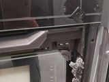 a close up of a microwave with the door open